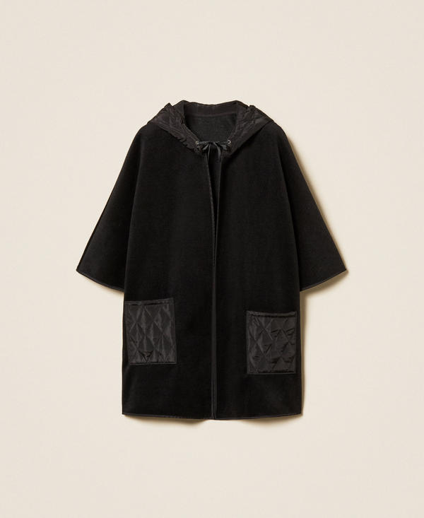 Knit poncho with pockets