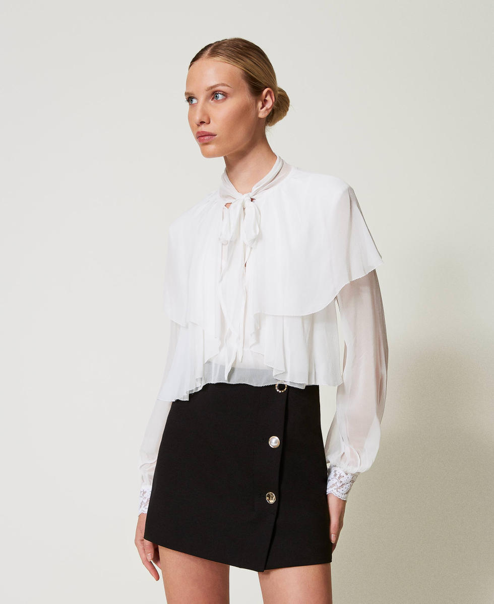 Miniskirt with jewel buttons