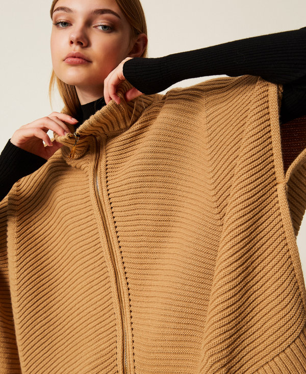 Knit poncho with zip
