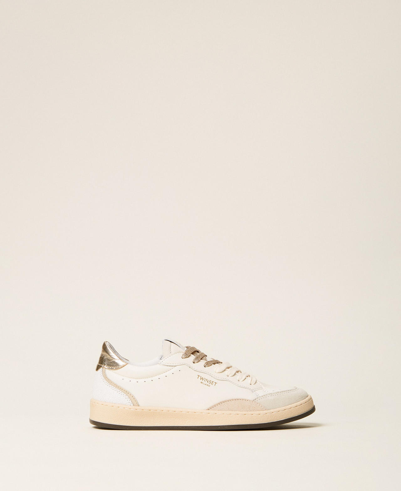 Leather trainers with logo and laminated inserts