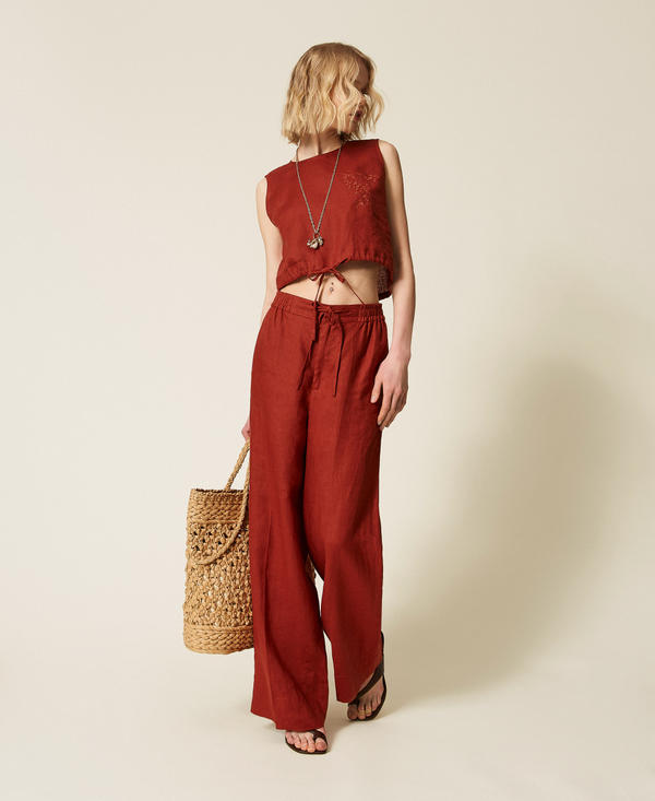 Linen top with embroidered logo