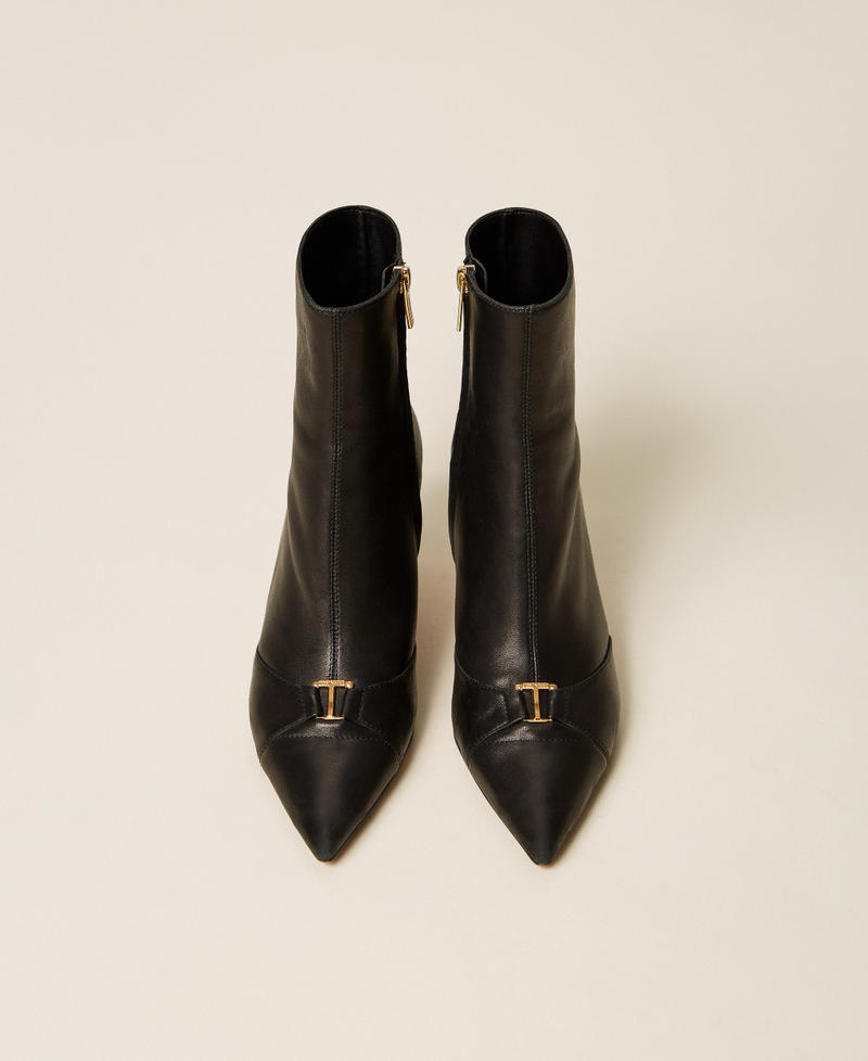 Stivaletti in pelle con logo Nero Donna 262TCP01E_00006_04