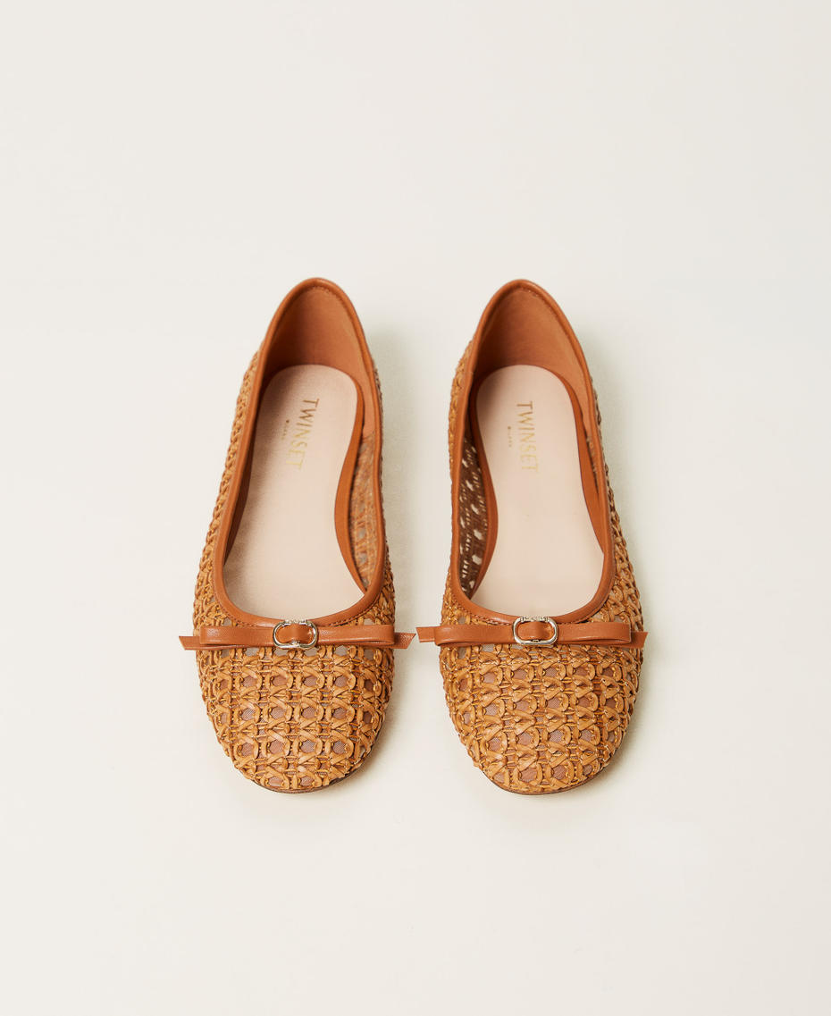 Ballet flats with a woven upper and bow