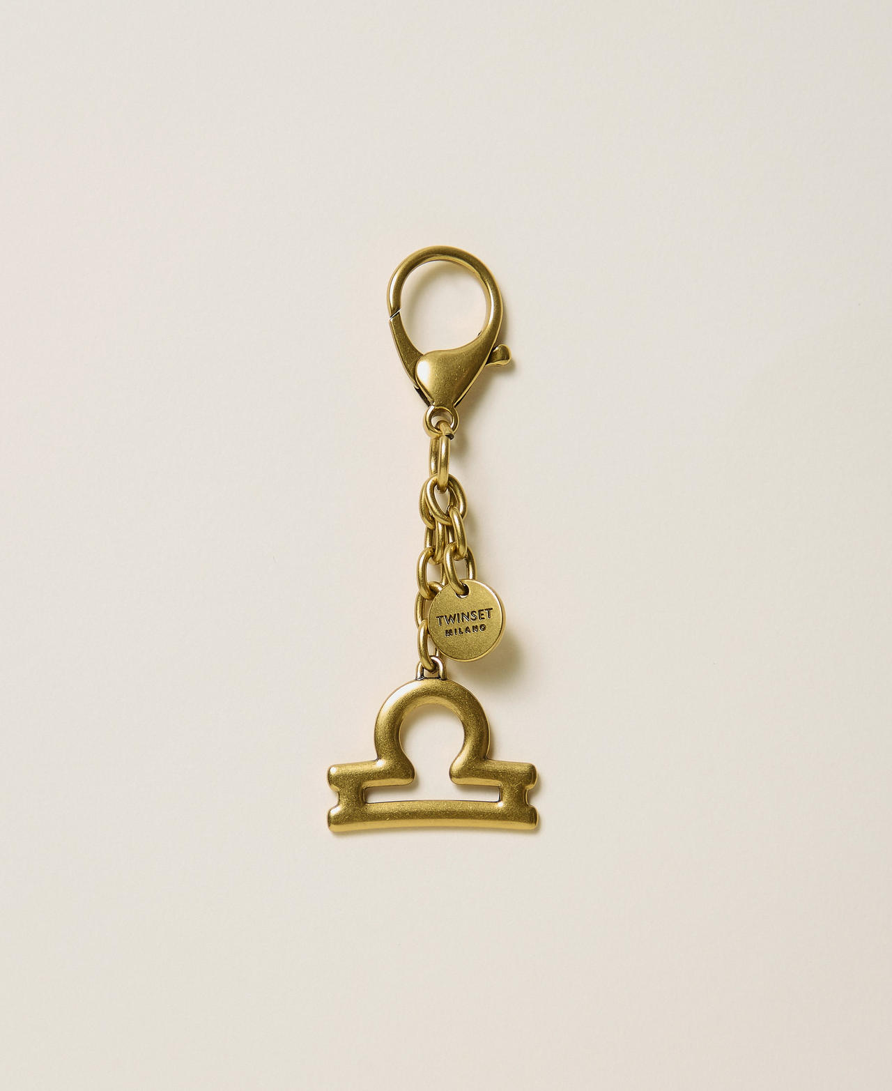 Porte-clés signe du zodiaque avec logo