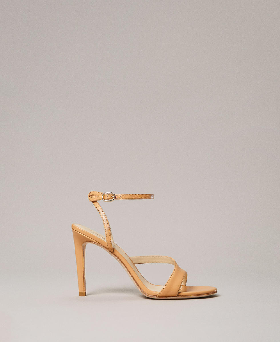 High-heeled leather sandals