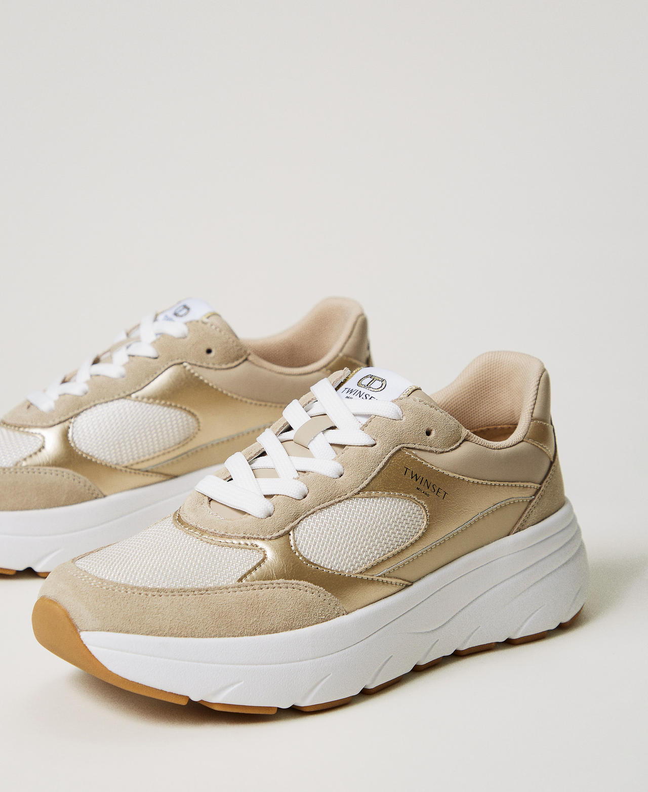 Sneaker im Laufschuhstil aus Leder Gelbgold Frau 251TCP02E_10366_02