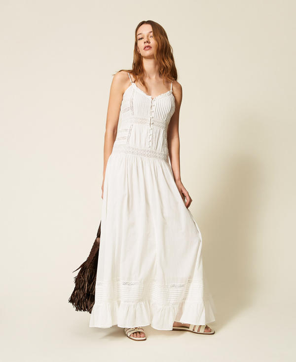 Long muslin dress with lace and ruffles
