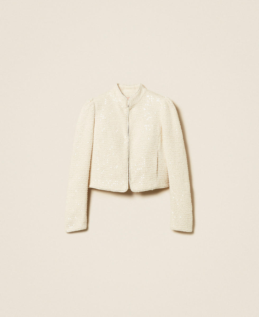 Blouson en tissu boucl&eacute; avec sequins