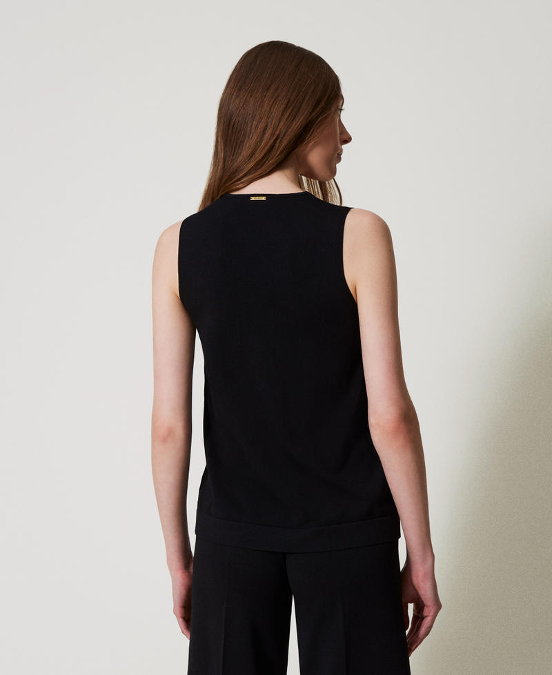 Knit top with heart sliders