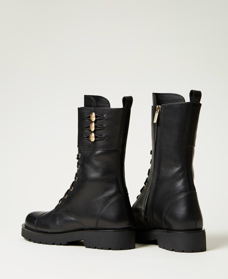 Bottines motardes en cuir avec boutons Noir Femme 251TCP146_00006_03