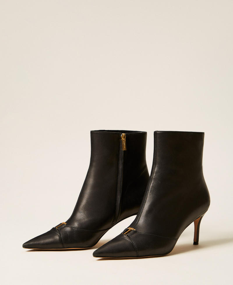 Stivaletti in pelle con logo Nero Donna 262TCP01E_00006_02